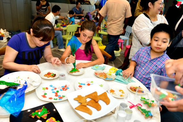 Children having fun at the gingerbread workshop